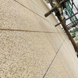 铁岭 黄金麻花岗岩荔枝面外墙干挂石材效果示例