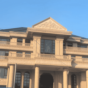 铁岭黄金麻别墅外墙干挂石材效果示例