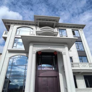 铁岭白麻别墅外墙干挂石材效果示例