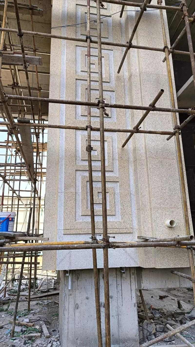 铁岭 黄金麻花岗岩别墅外墙干挂回纹造型效果