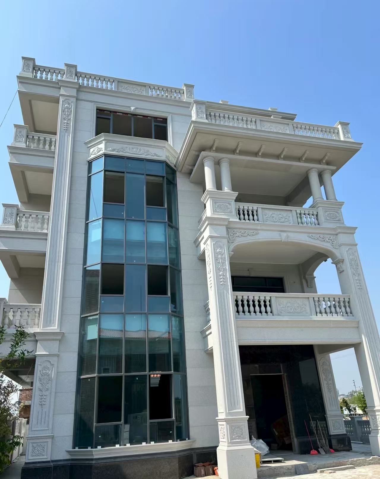 铁岭 白麻花岗岩别墅外墙干挂效果展示