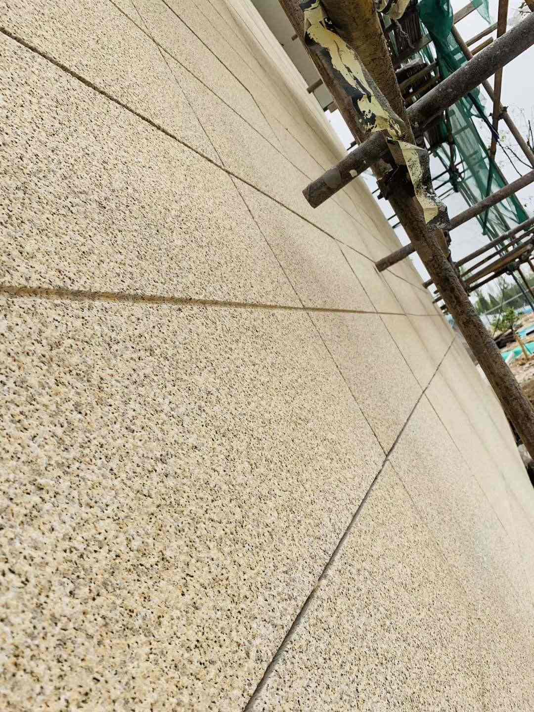 铁岭 黄金麻花岗岩荔枝面外墙干挂石材效果示例